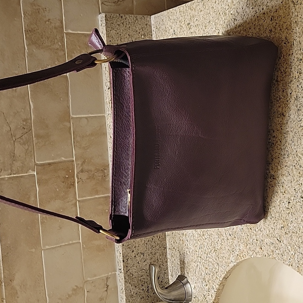 NWOT Portland Leather Company Triangle bag in plum
